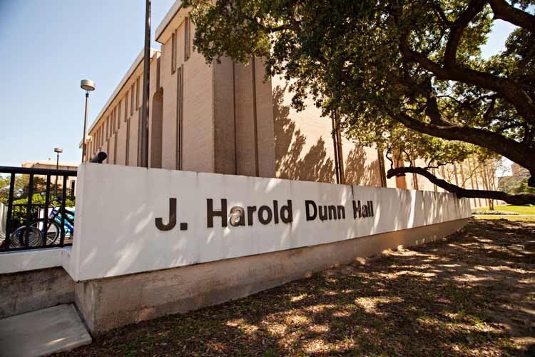 Exterior sign of Dunn Hall that has the full namesake of the dorm hall: J. Harold Dunn Hall 