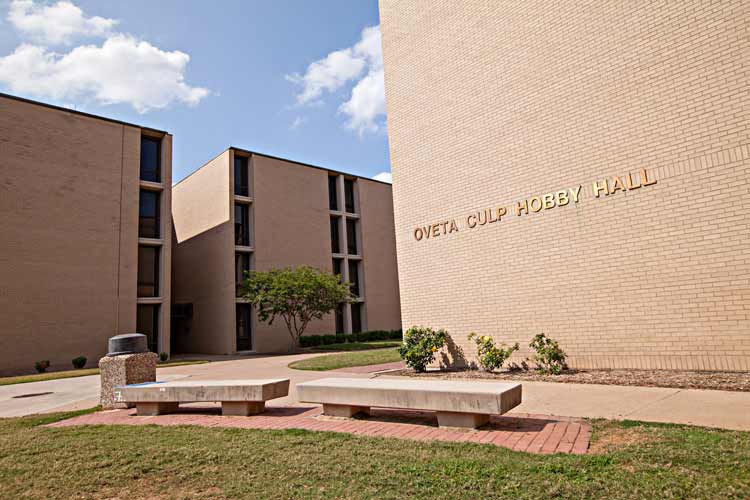 Full namesake on the exterior of the building, “Oveta Culp Hobby Hall,” 2 benches