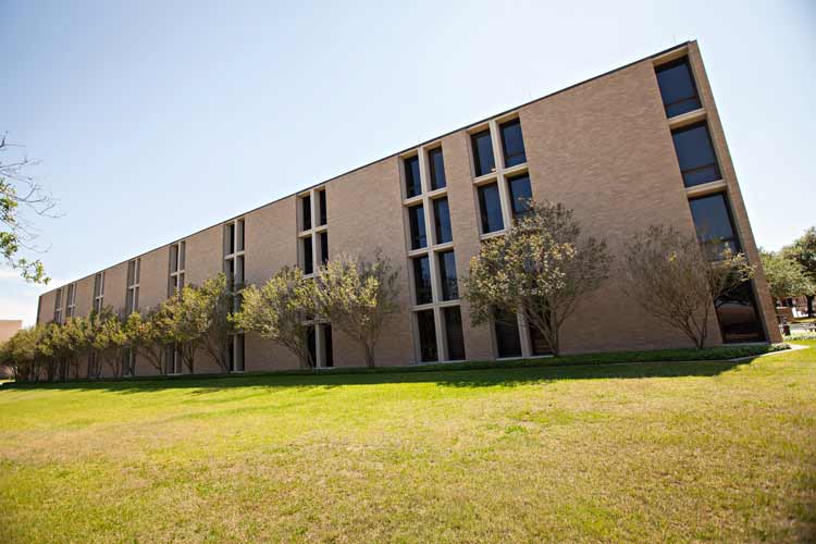 Side exterior of Rudder Hall showing windows from 1st to 4th floor. 