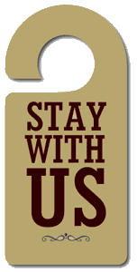 A door tag that says Stay with Us