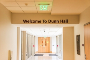 "Welcome to Dunn Hall" Sign above interior hallway leading into Dunn Hall