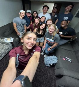 APM Christina Garza '24 & her residents in Hobby Hall